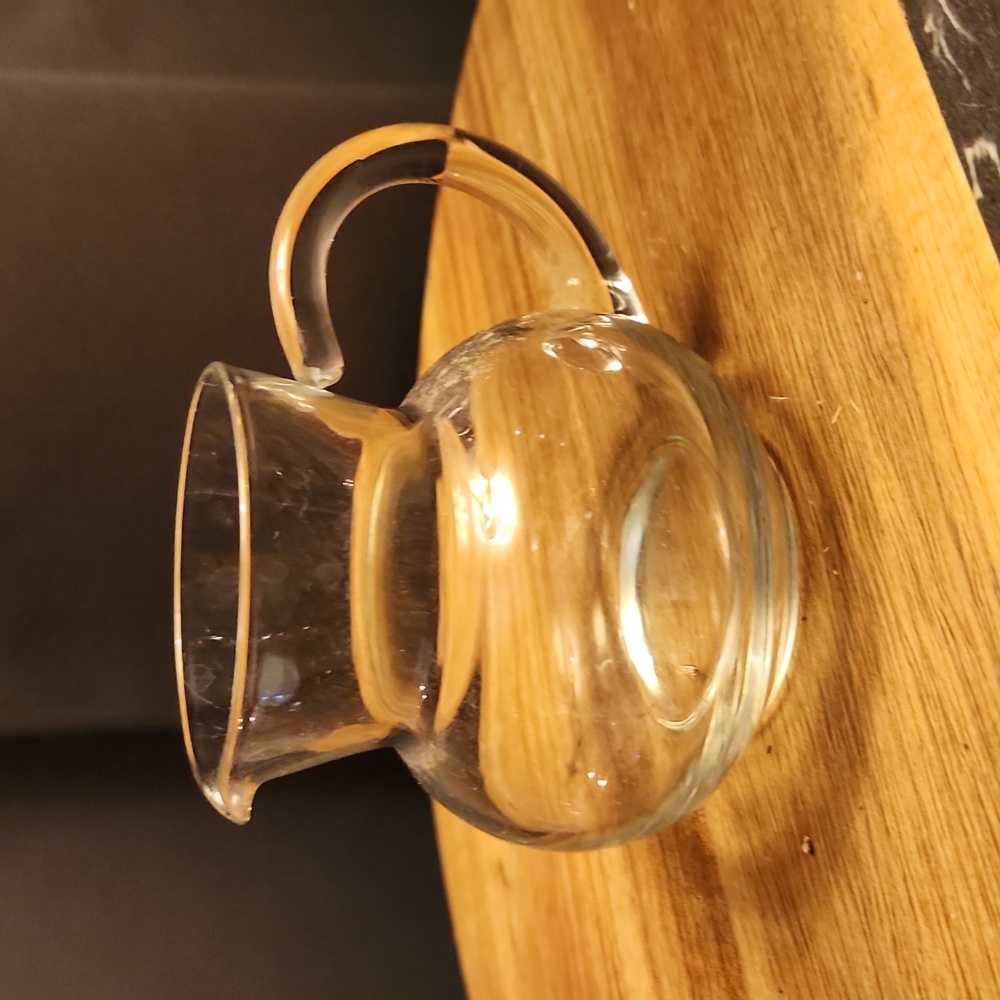 Mini clear pitcher 4in high 3 in tall little carafe. with spout and handle.